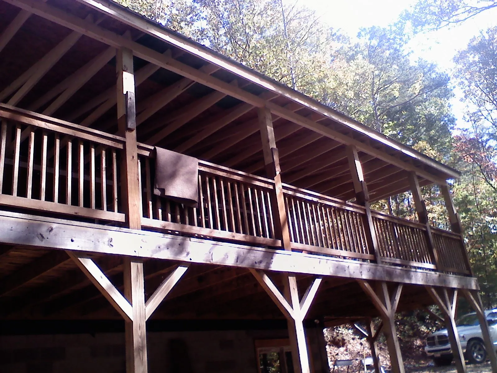 Timber framing under a new elevated porch and deck — Roof Leak Repair in Trout Creek by Roofing Brothers
